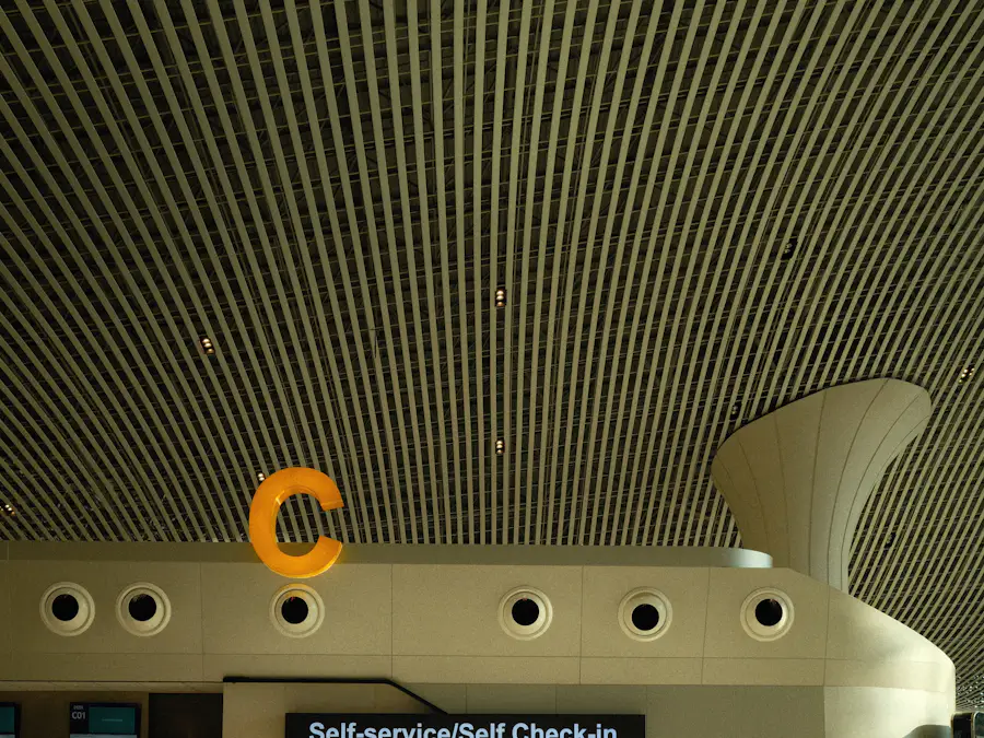 A traveller at a self check-in counter in an Indonesian airport